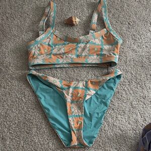 Dippin Daisy’s Floral Bikini Set in Orange and Blue